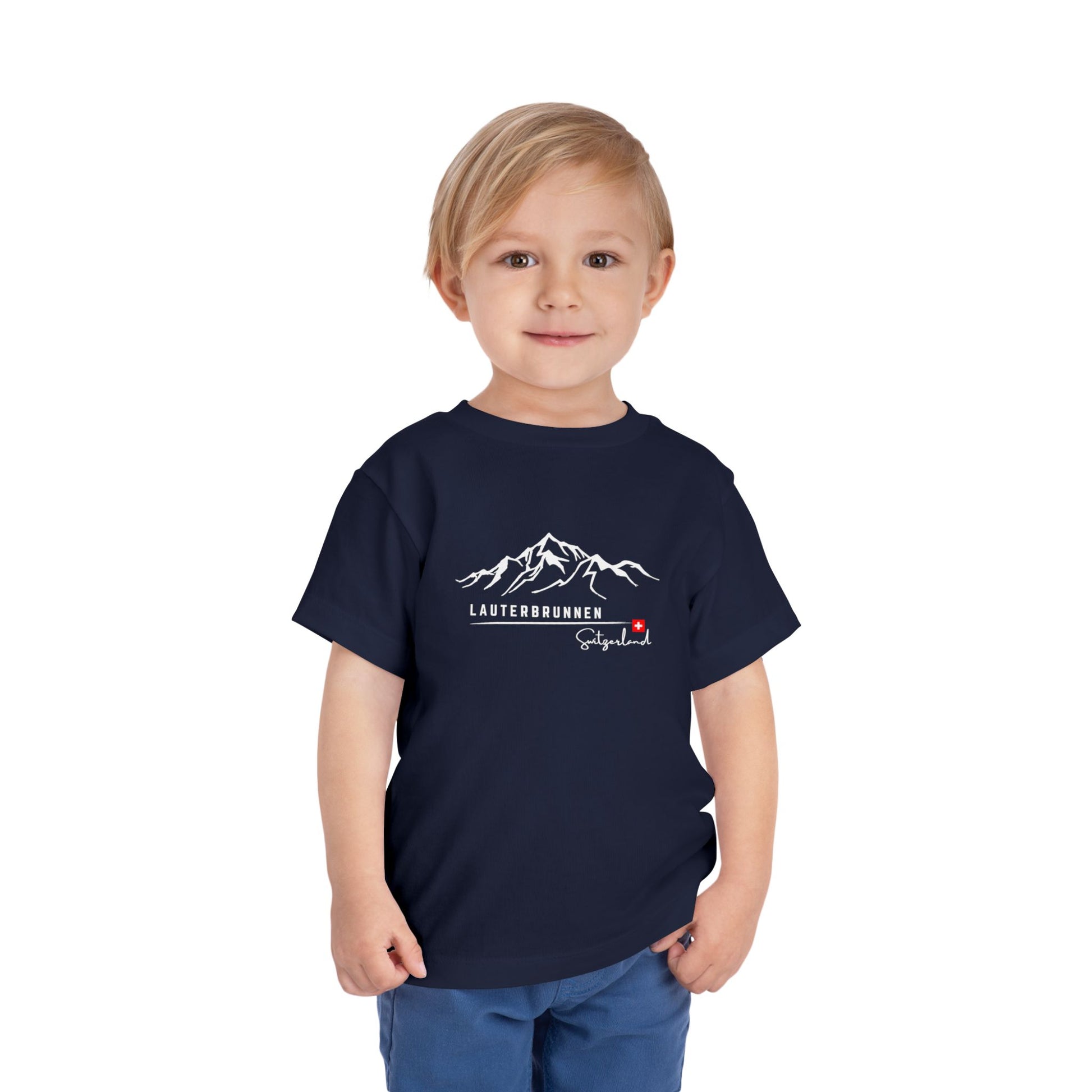 Toddler wearing navy Swiss Alps adventure t-shirt