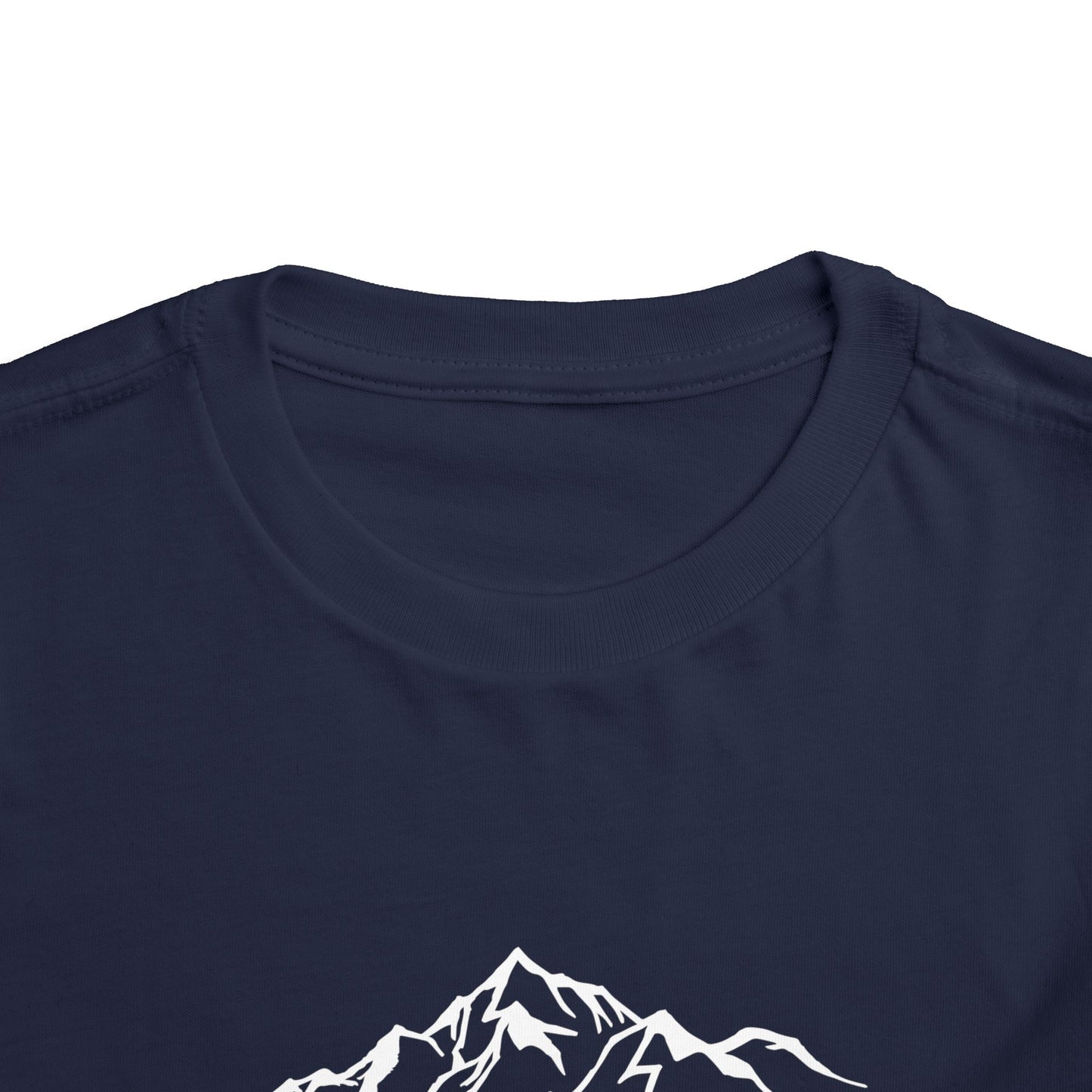 Flat lay of pink Lauterbrunnen toddler tee with mountain graphic
