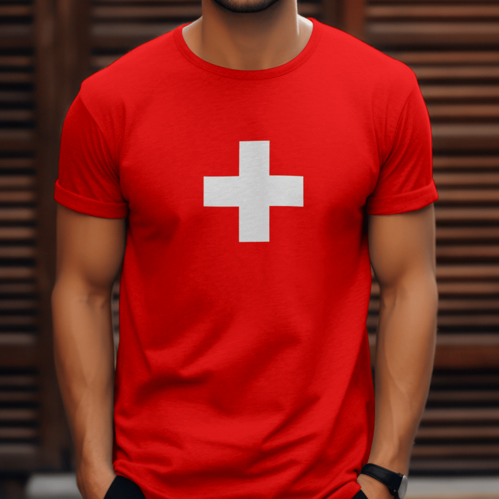 Man proudly wearing a red Swiss Flag T-Shirt with a bold white cross, ideal for Swiss National Day, sports events, and expressing Swiss pride.