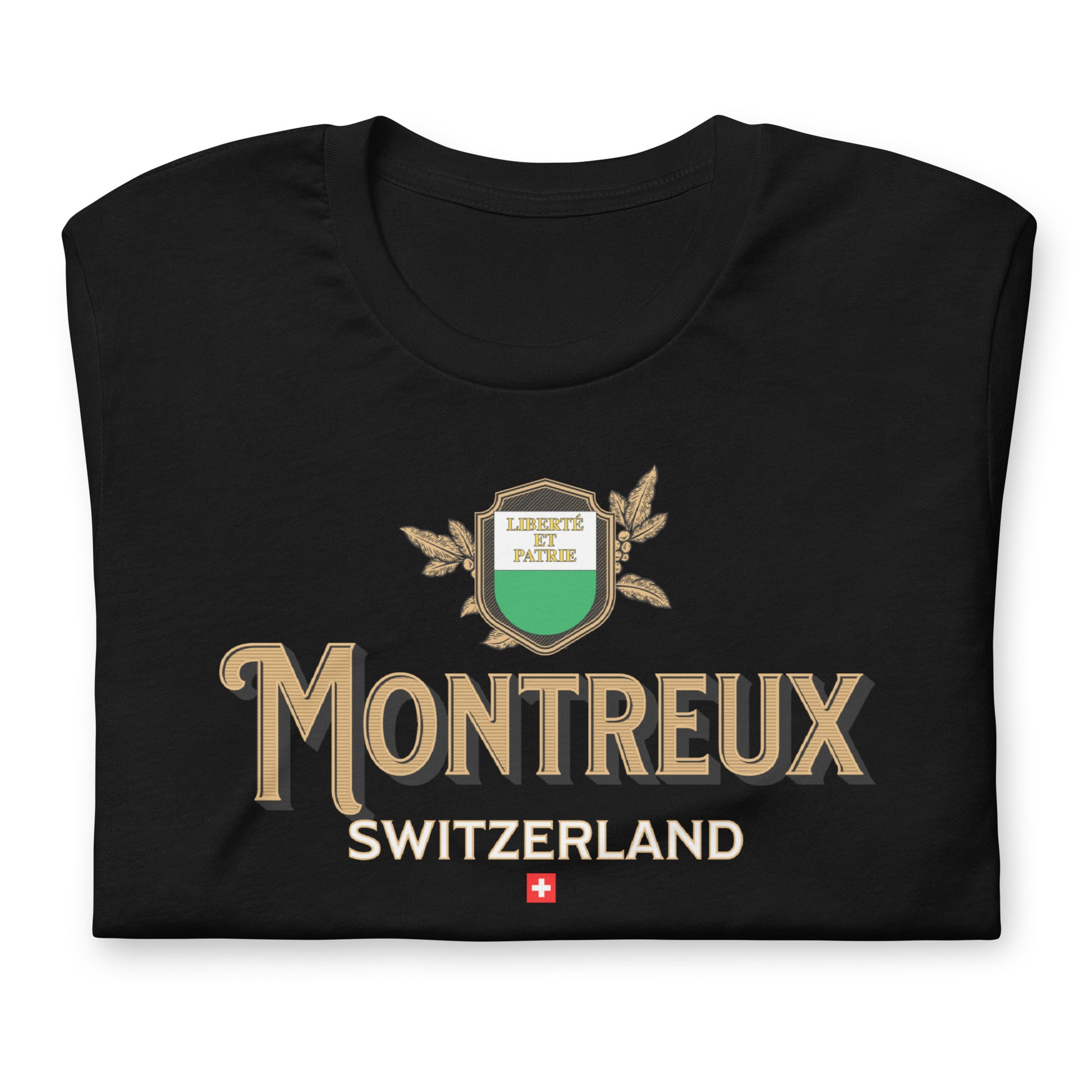 Close-up of Montreux crest design on a black unisex tee, premium fabric.