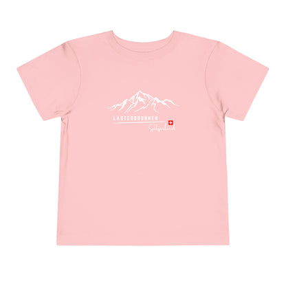 Pink toddler tee showcasing Swiss Alps adventure graphic