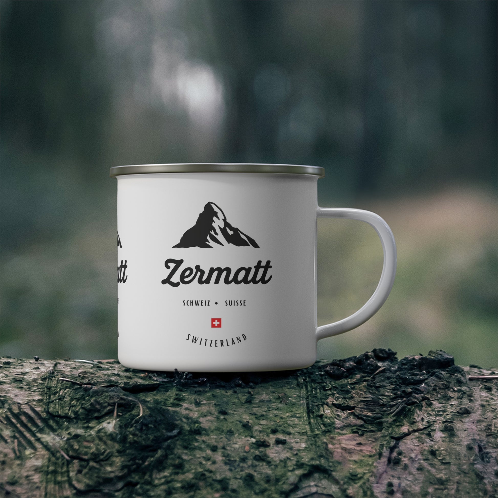 White enamel camping mug with minimalist black Matterhorn mountain silhouette graphic - Zermatt Switzerland design