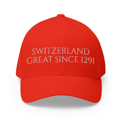 Red Switzerland Great Since 1291 embroidered baseball cap, front view showing white embroidered text on structured red cap