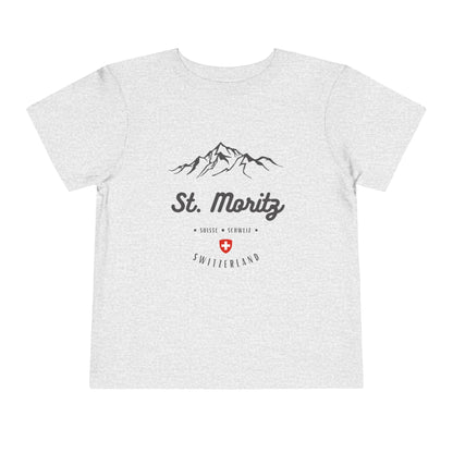 Gray toddler tee with an alpine mountain print and "St. Moritz" text.
