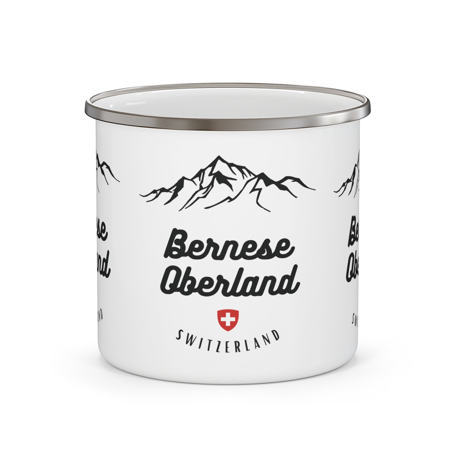 White enamel mug with mountain design and 'Bernese Oberland Switzerland' text on a white background