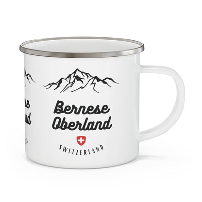 White enamel camping mug featuring Berner Oberland Switzerland mountain badge, perfect for outdoor adventures