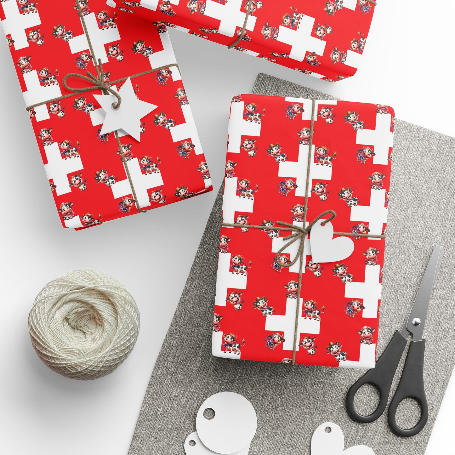 Swiss cow wrapping paper with red and white Swiss flag pattern