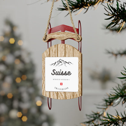 Rustic wooden sled ornament souvenir from Switzerland featuring Alps design