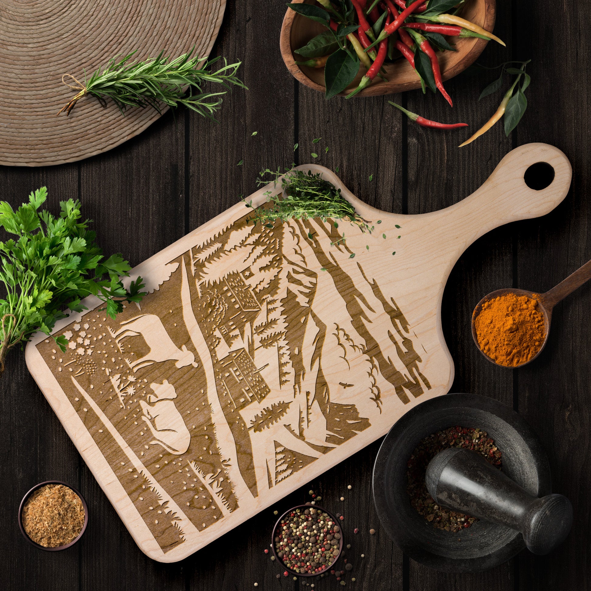 Swiss-inspired cutting board with papercut design of Binntal Nature Park in Upper Valais