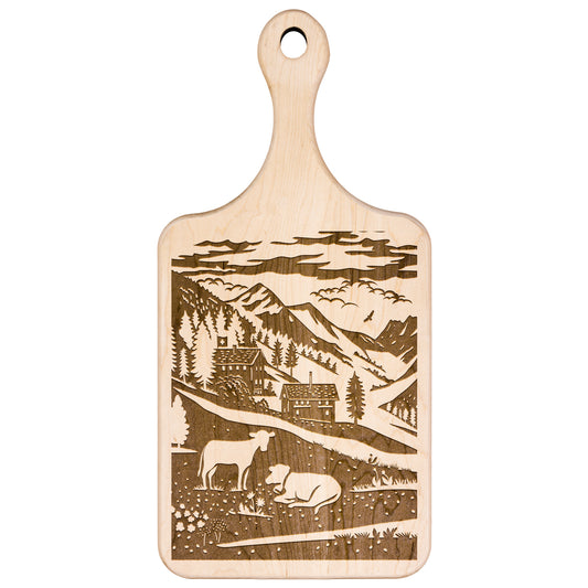 Outdoor-themed cutting board with Swiss alpine village, chalet, and cow design