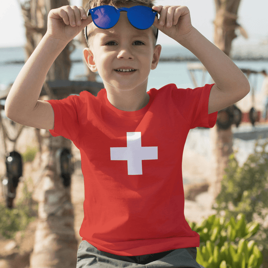 Red kids’ t-shirt featuring the iconic Swiss cross, perfect for young Swiss fans