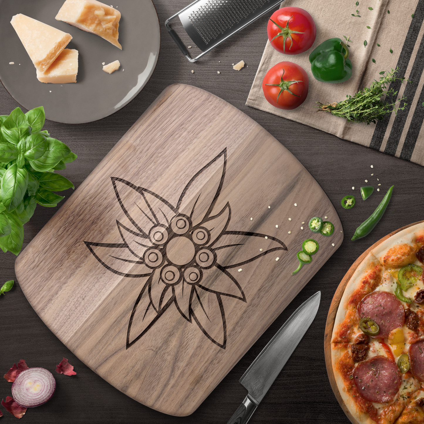 Dark rounded Edelweiss cutting board lifestyle shot in modern kitchen setting with Swiss Alpine heritage design