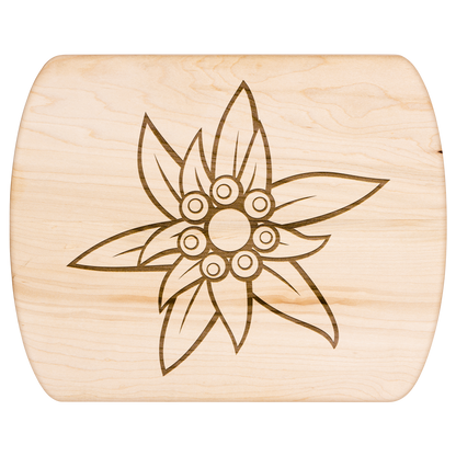 Light wood Edelweiss cutting board size comparison showing 15 inch and 11.5 inch options with Swiss flower motif