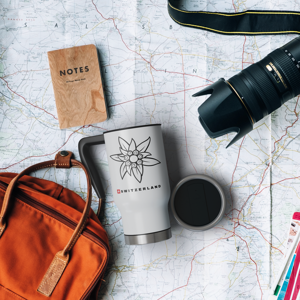 Overhead view of a white Edelweiss travel mug with screw-on lid