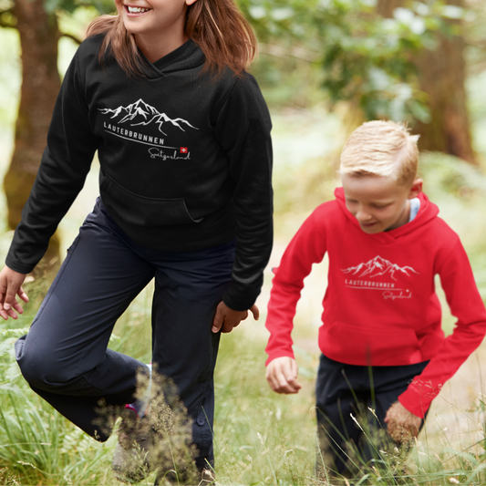 Kids pullover hoodie featuring the enchanting beauty of Lauterbrunnen – a perfect souvenir from Switzerland