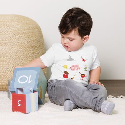 White baby t-shirt featuring Swiss landmarks and icons
