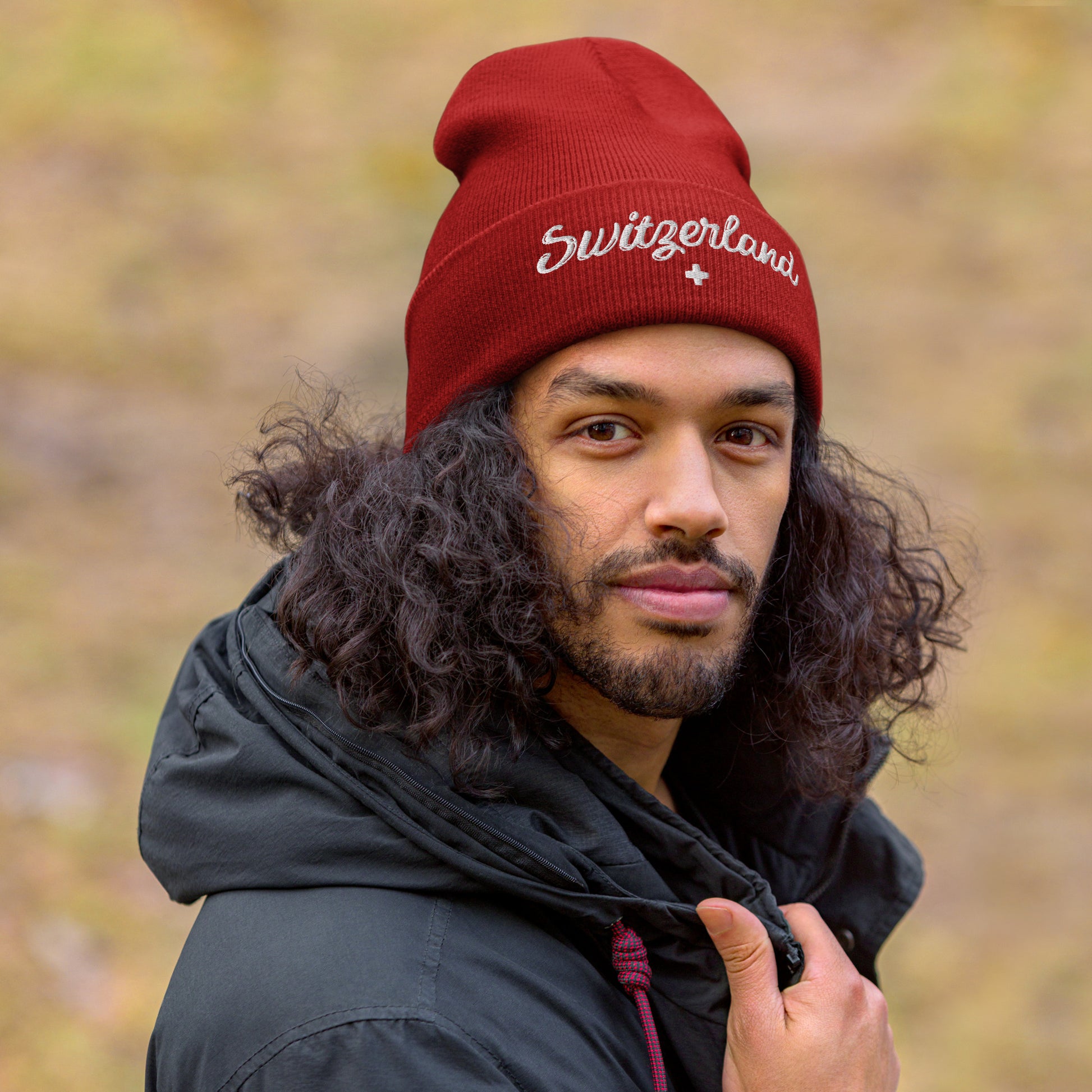 Unisex red beanie with "Switzerland" embroidery and cross logo