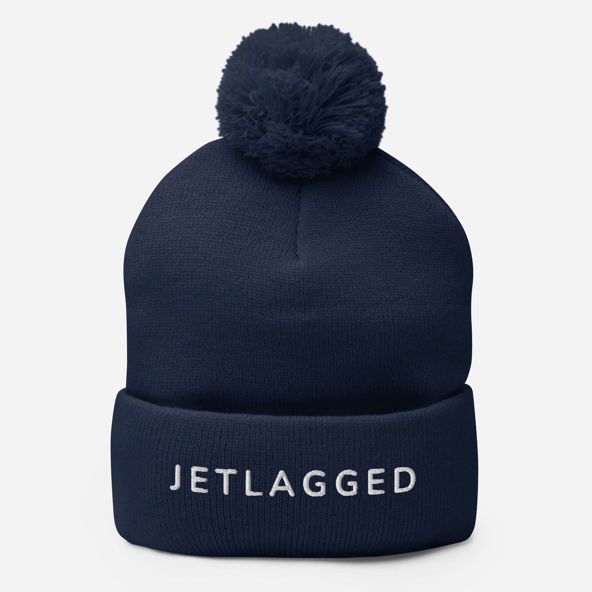 Stylish travel beanie with warm knit fabric and pom-pom top