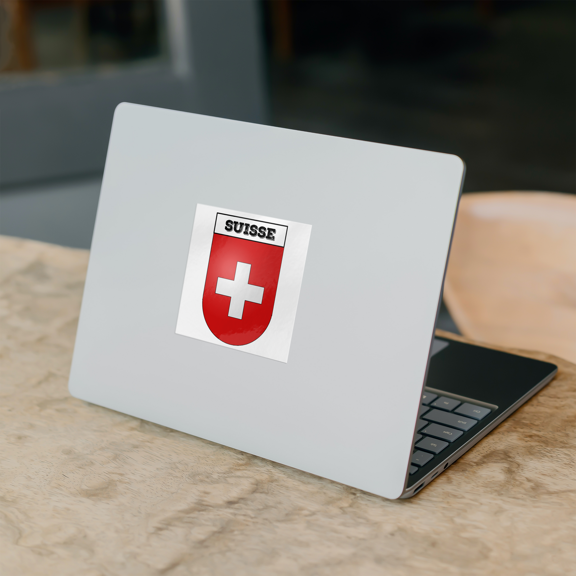 Suisse-Suisse coat of arms sticker applied to a surface – Swiss heritage souvenir decal