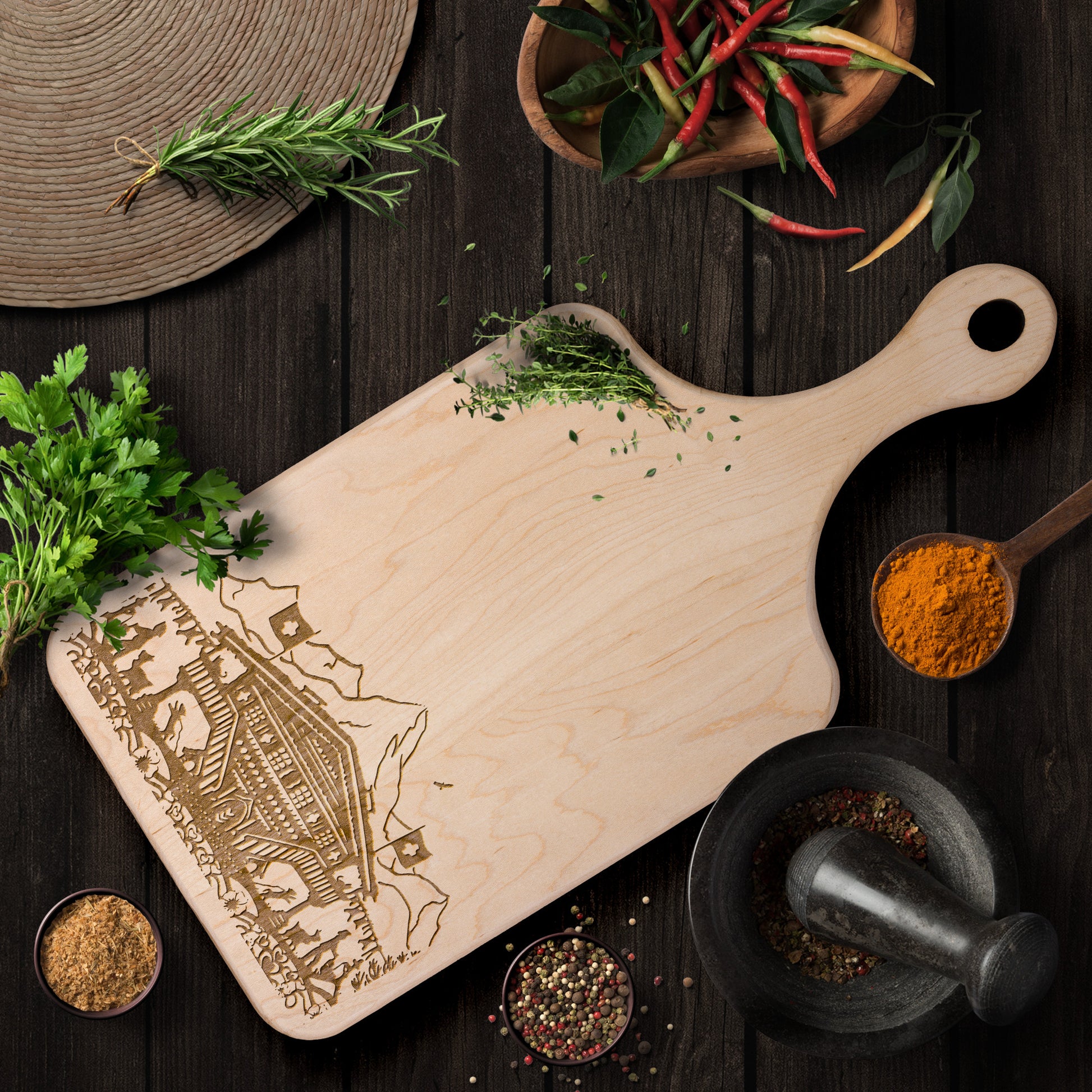 Wooden cutting board featuring Swiss chalet and mountain design