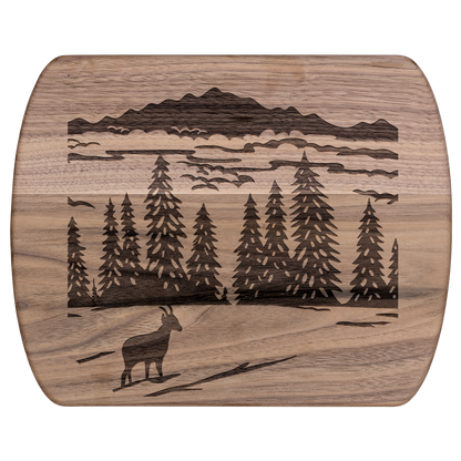 Premium Swiss-inspired cutting board featuring alpine chamois papercut design, perfect for nature lovers and kitchen enthusiasts