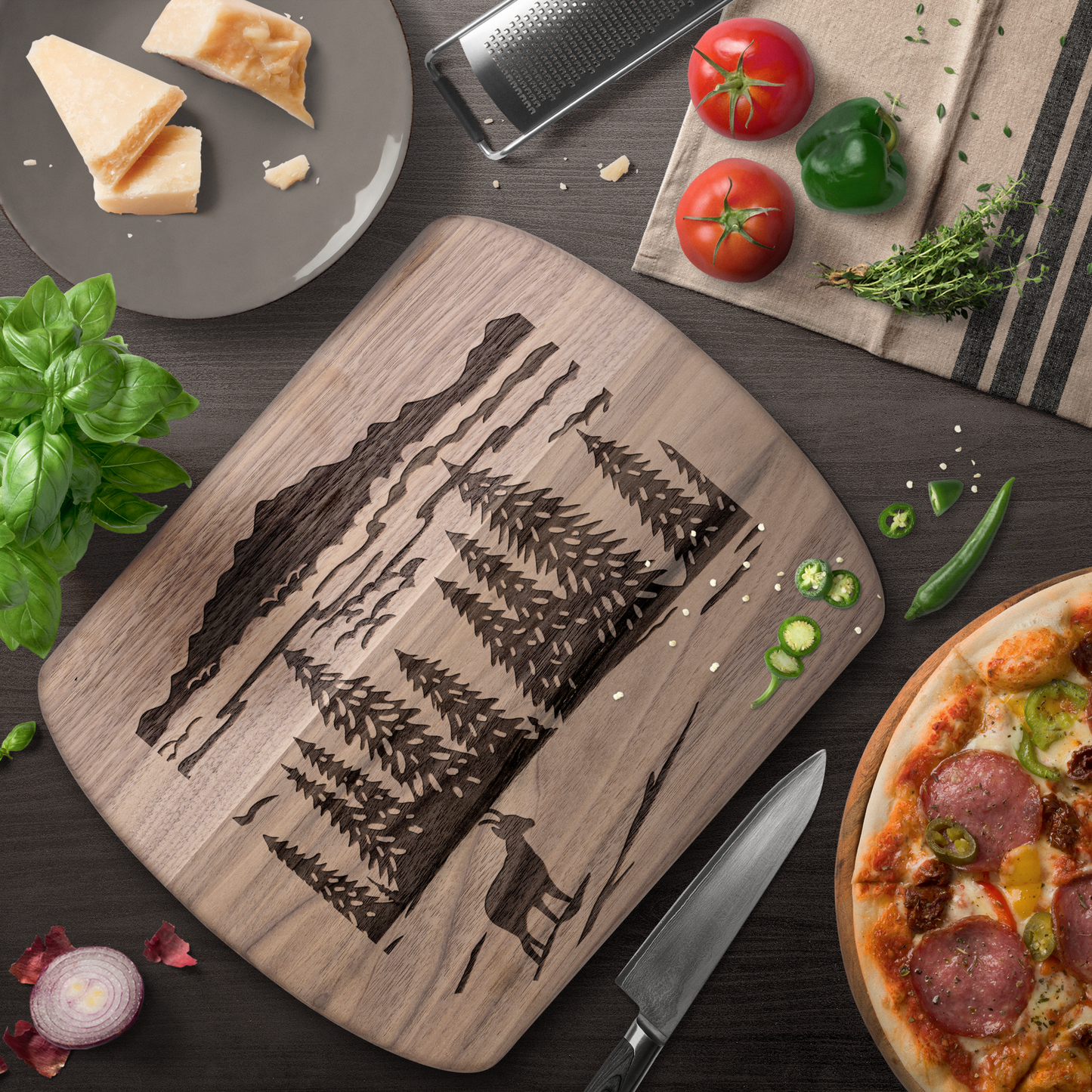 Swiss chamois cutting board with scherenschnitt alpine silhouette design in dark wood finish