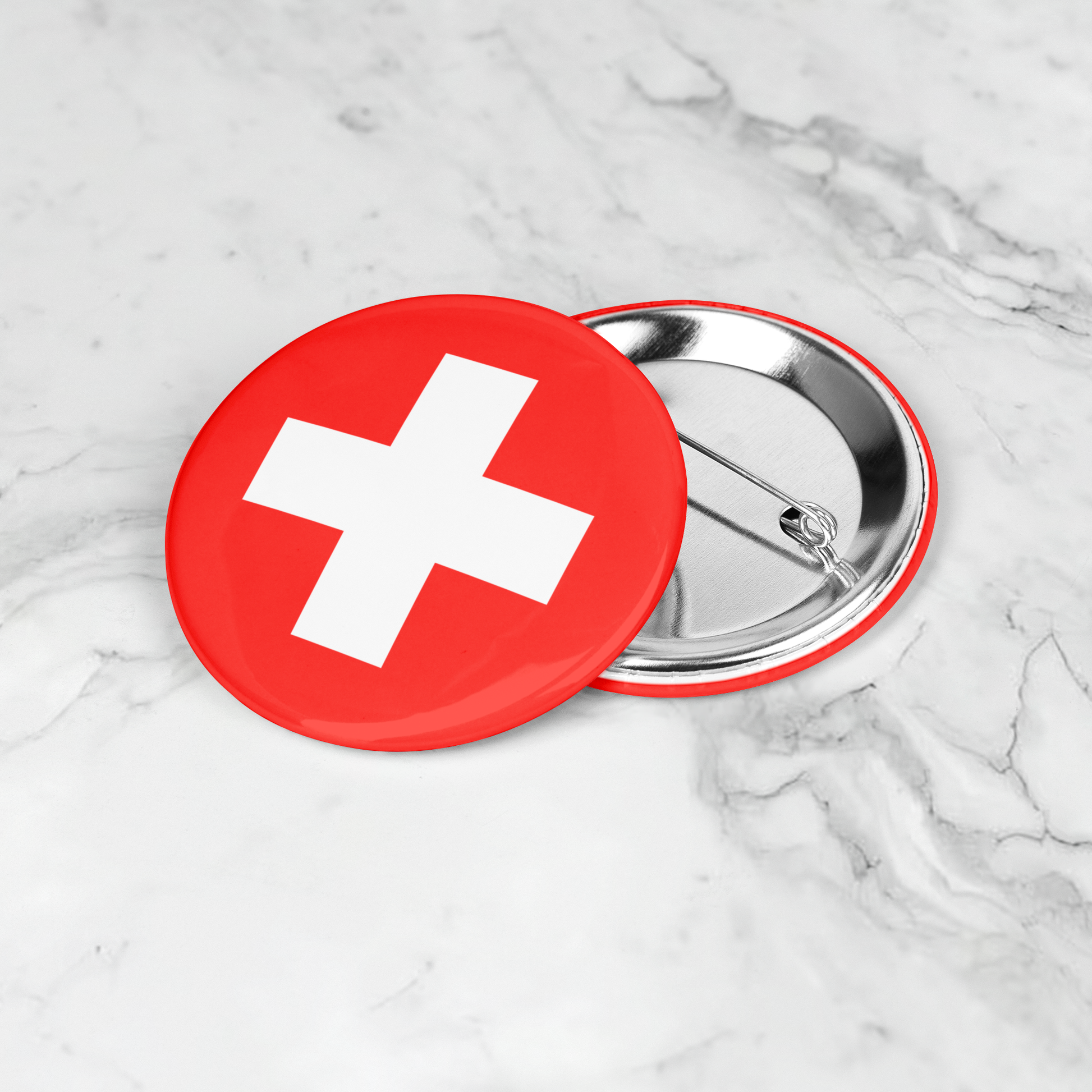 Swiss flag button pin 2.25 inch on white background