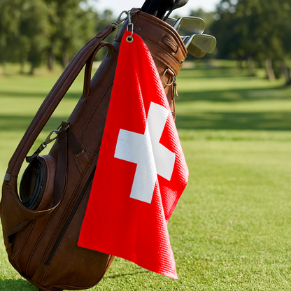 Swiss Flag golf towel hanging from a golf bag hook — perfect Swiss souvenir for golfers