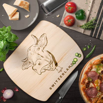 Rustic Swiss cow-themed cutting board, perfect for kitchen decor