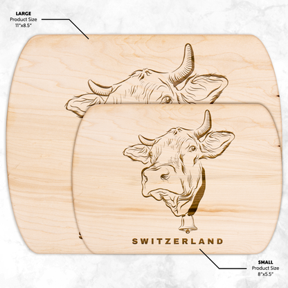 Swiss cow cutting board with engraved Alpine design in premium wood, perfect for cheese serving and rustic kitchen decor