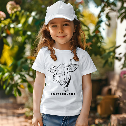 Little girl wearing Switzerland cow t-shirt in white