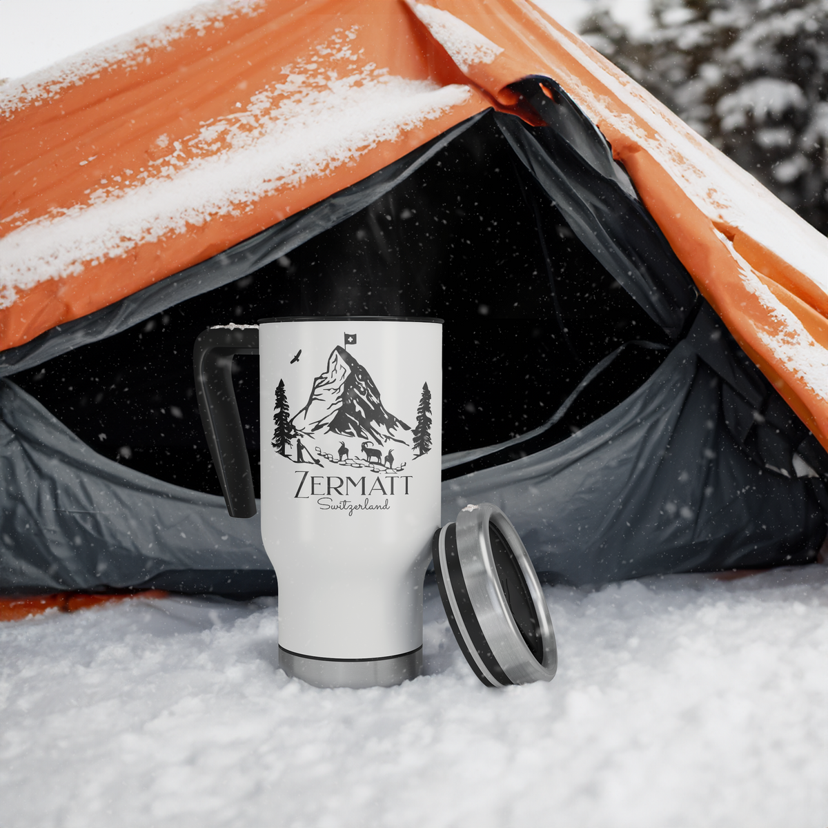 Zermatt Switzerland travel mug sitting on snowy tent floor during winter camping trip