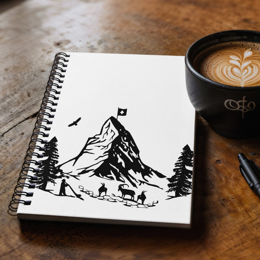 Spiral bound notebook with minimalist black and white Matterhorn mountain illustration on cover