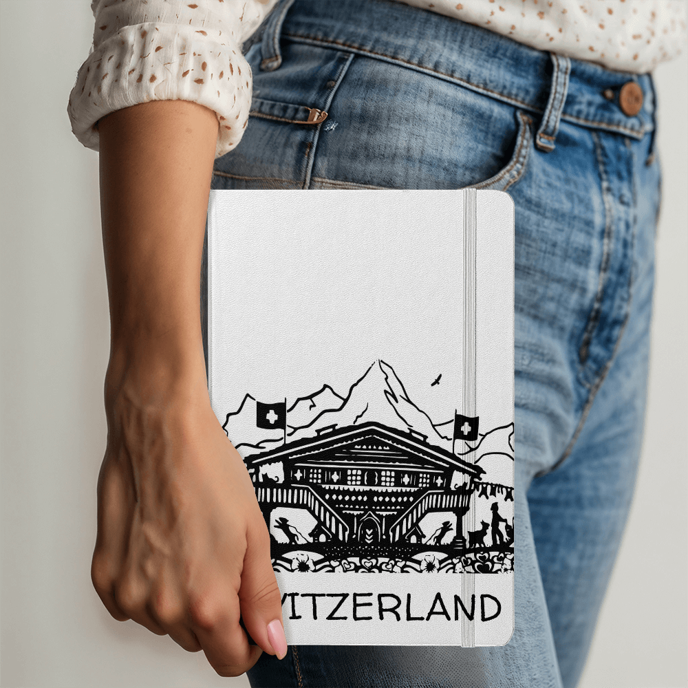 Minimal black and white Switzerland journal featuring traditional Swiss papercut art