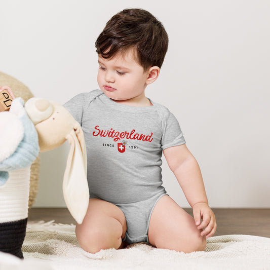 Baby bodysuit with "Switzerland Since 1291" and red Swiss emblem