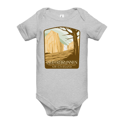 Scenic Swiss Alps infant onesie featuring Lauterbrunnen cliffs and trees.