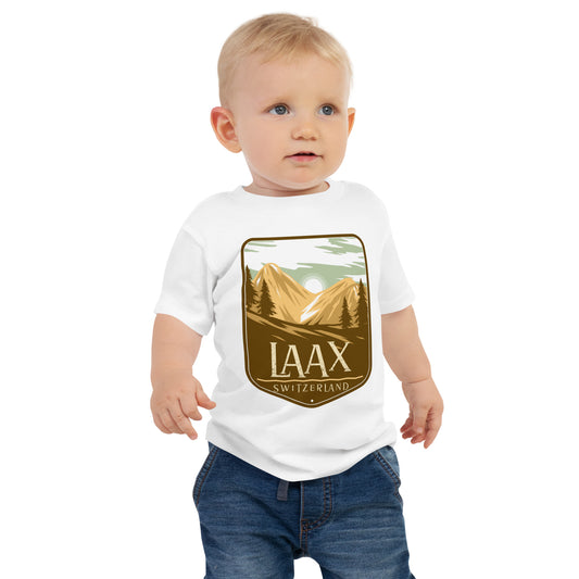 Baby wearing Laax Switzerland t-shirt with mountain design