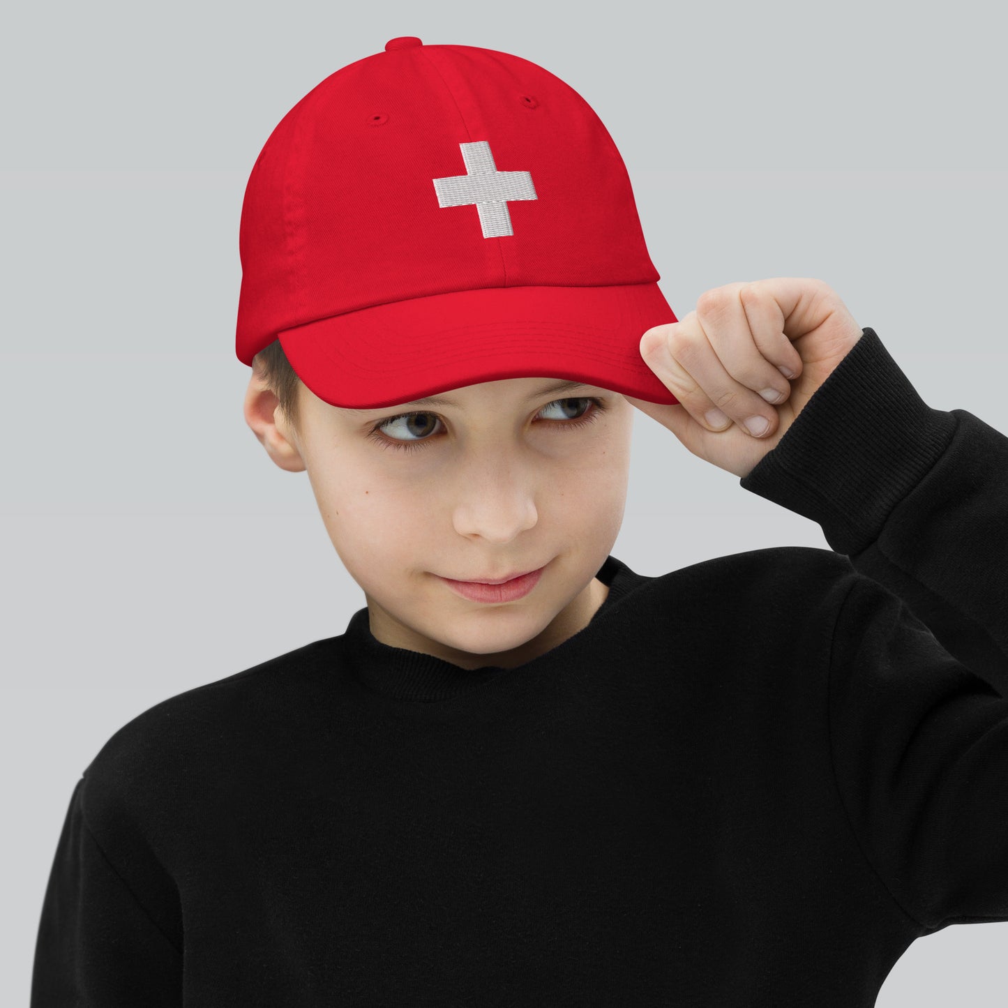 Kids Swiss heritage baseball cap with red cross embroidery, perfect for sports and outdoor activities