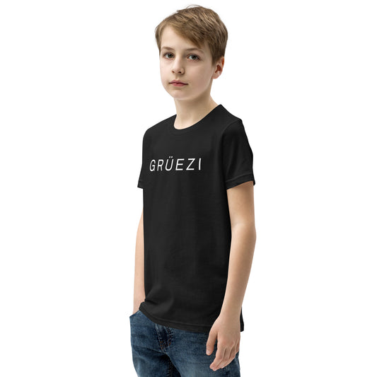 Youth boy wearing black GRÜEZI t-shirt in modern style